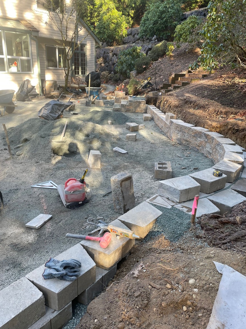Hardscape project in progress with stone base and block work