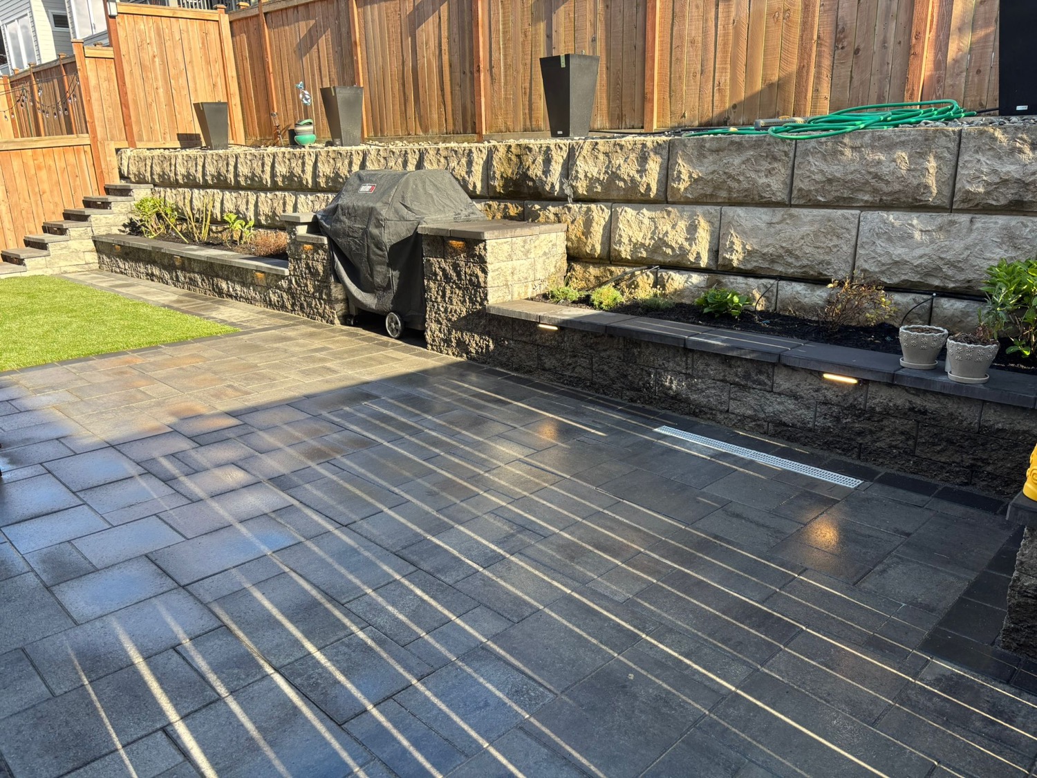 Finished side yard paver walkway after rain
